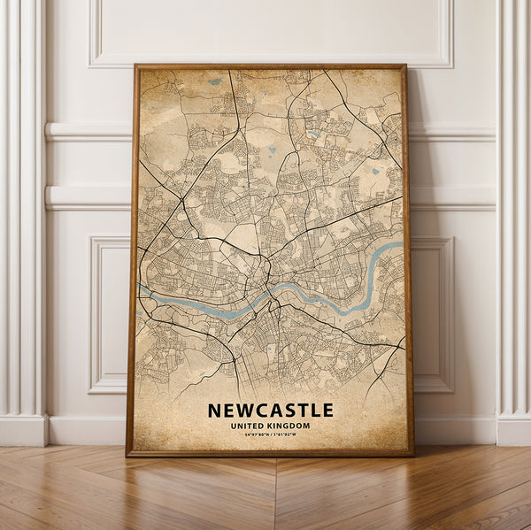 a framed map of newcastle, england on a wooden floor
